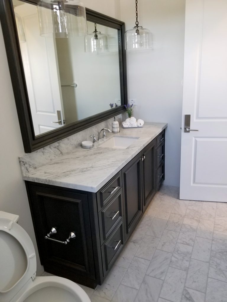 Black bathroom cabinets with deals white countertops