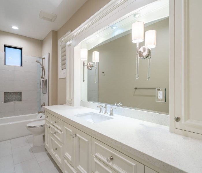 transitional style bathroom vanity in white with white quartz countertop