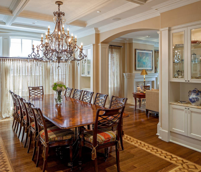 traditional style dining room in white with dark wood accents