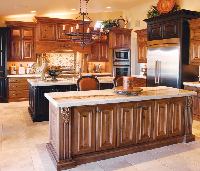 transitional style kitchen with island in black and dark wood stain with white quartz countertops
