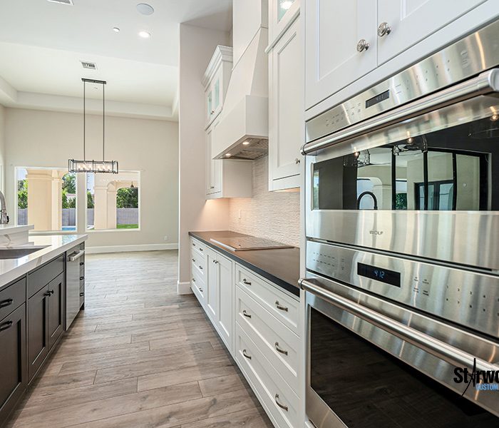 custom-transitional-kitchen-white-cabinets-dark-wood-stain-island-5