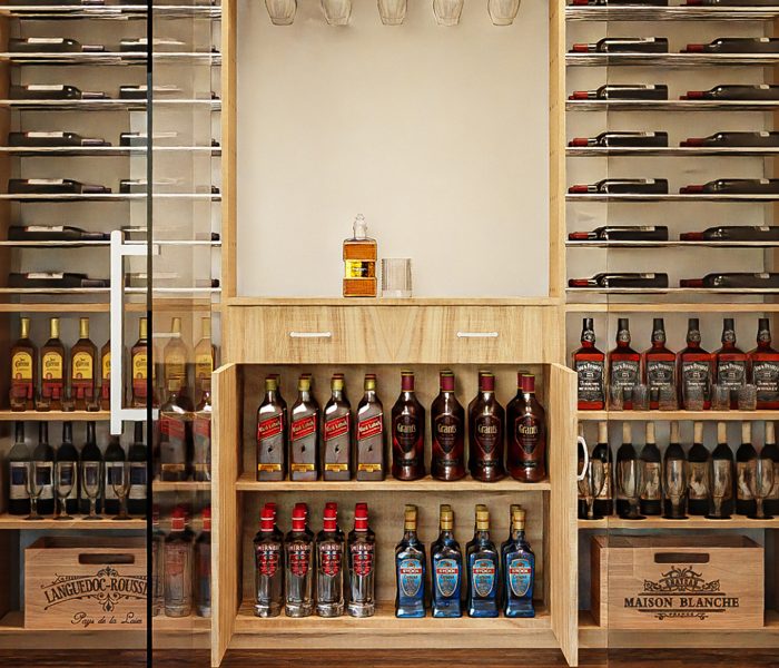 custom-wine-room-cellar-wall-glass-light-wood-finish